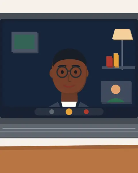A laptop on a video call with an interviewer
